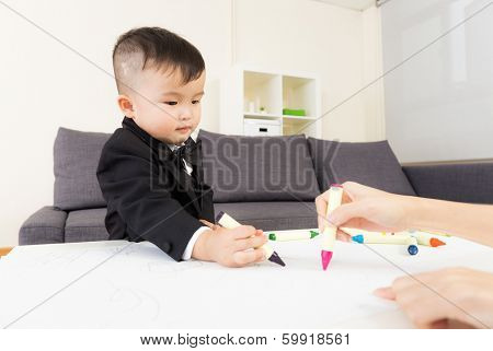 Aisa baby boy drawing at home