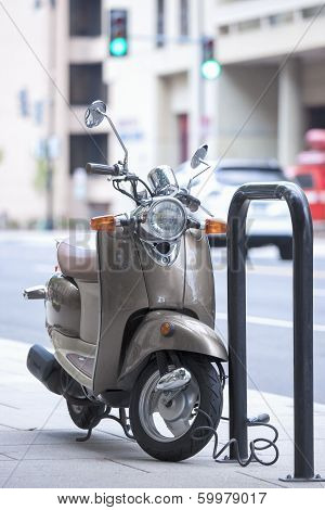 Moderns Scooter Parked At City