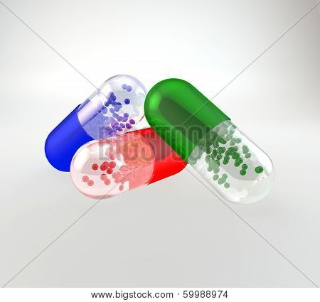 Colorful capsules set on the white background