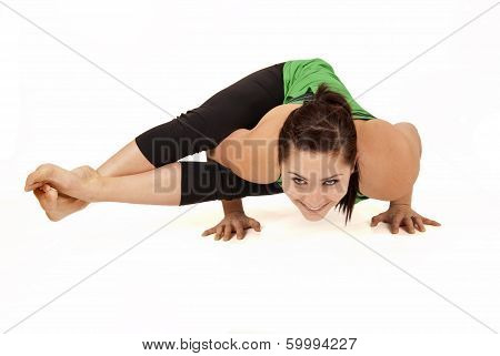 Woman Doing Yoga Pose Called Eight Angle Pose
