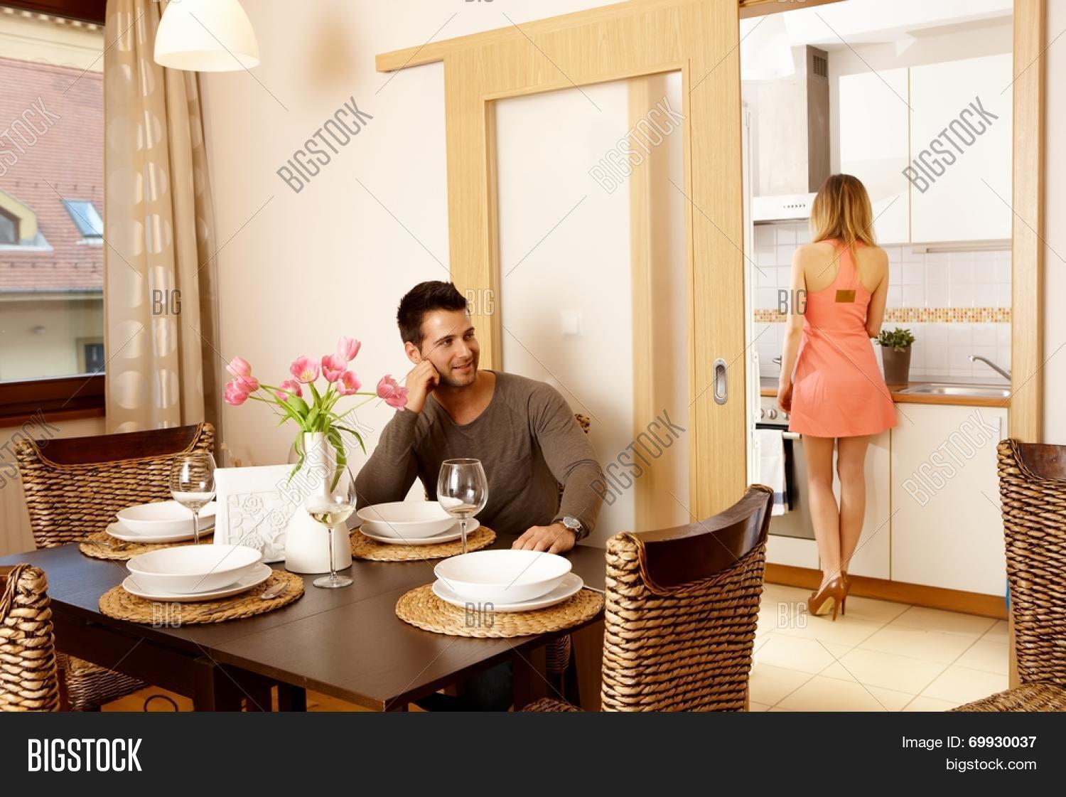 Young Waiting Image Photo Free Trial Stock Young Waiting For Dinner Guests At Home Woman In Kitchen Cooking
