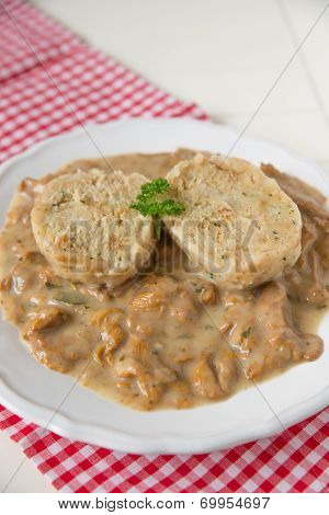 Dumplings with chanterelle mushroom sauce