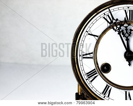 Old Clock With Roman Numerals.