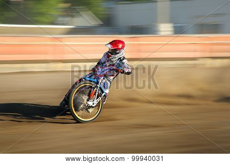 Speedway rider on the track