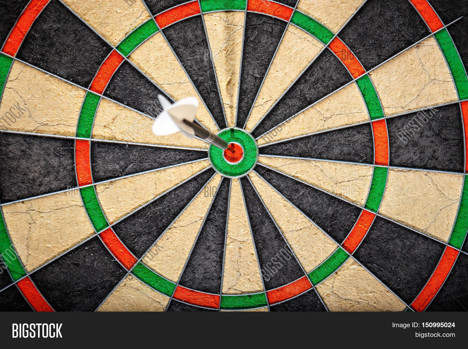 the darts in bulls eye close up
