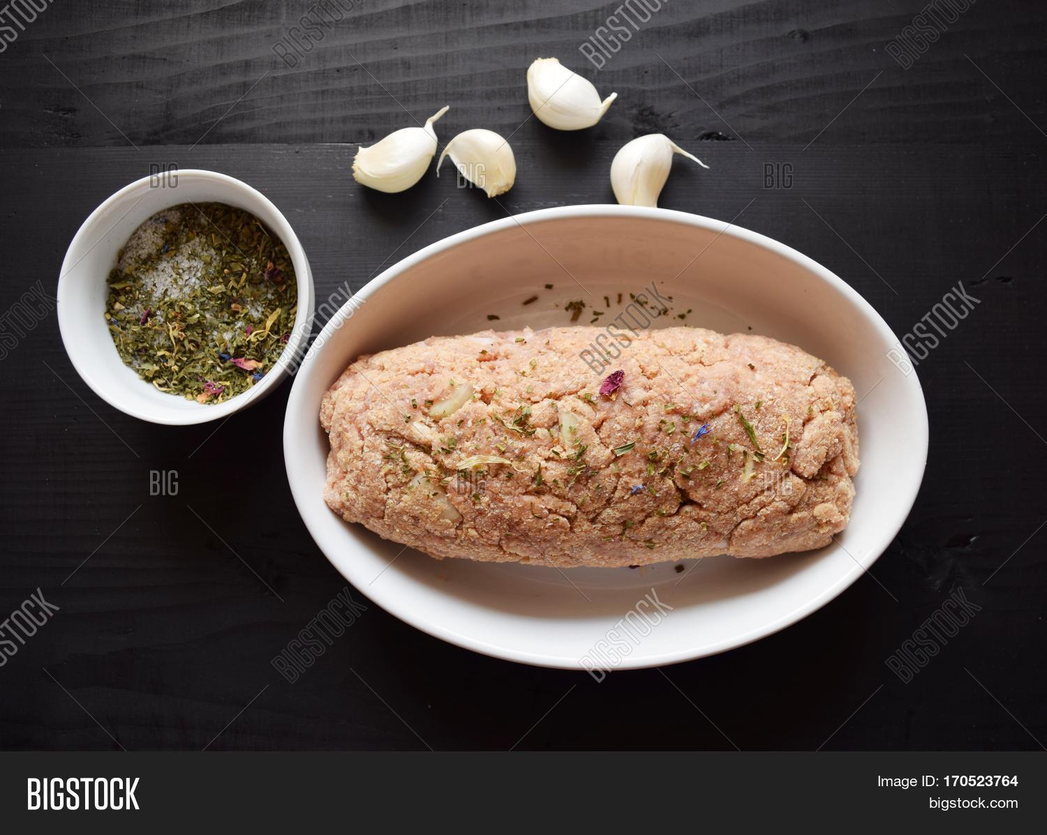 minced meat and ingredients on the table.
