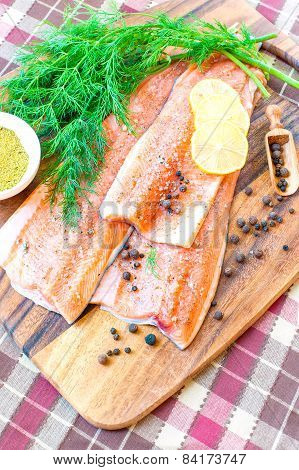 fresh salmon/trout in marinade- ready to eat, ready to cook.