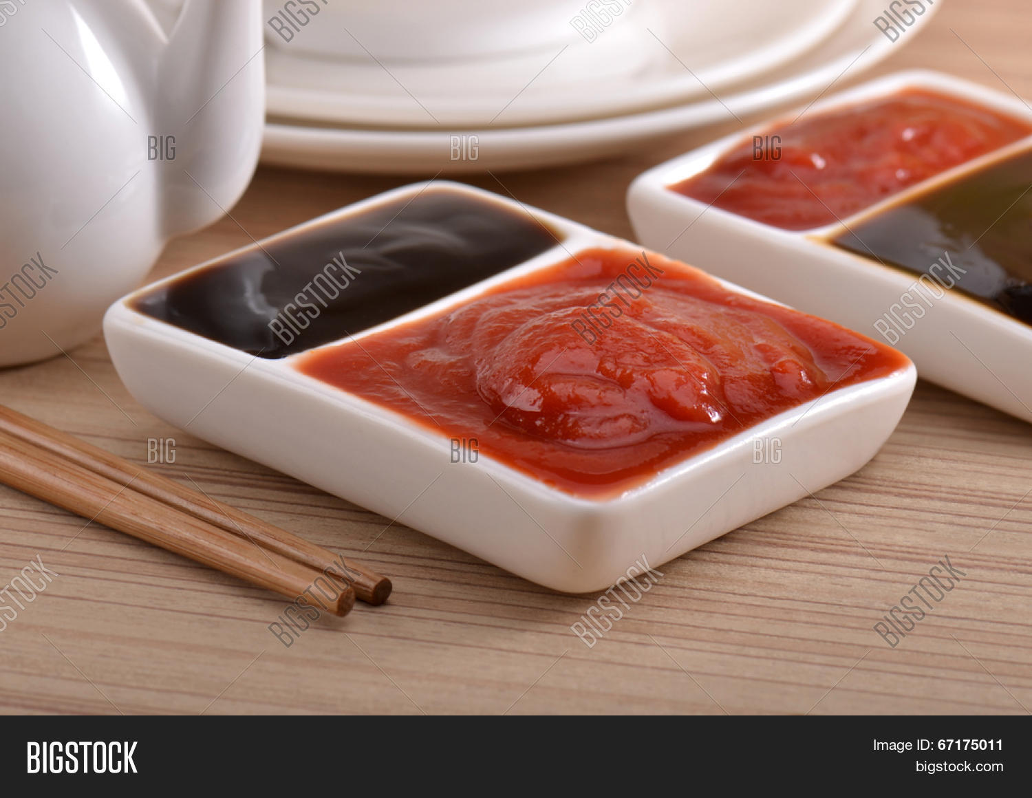 sauces on the table , oyster sauce and tomato sauce