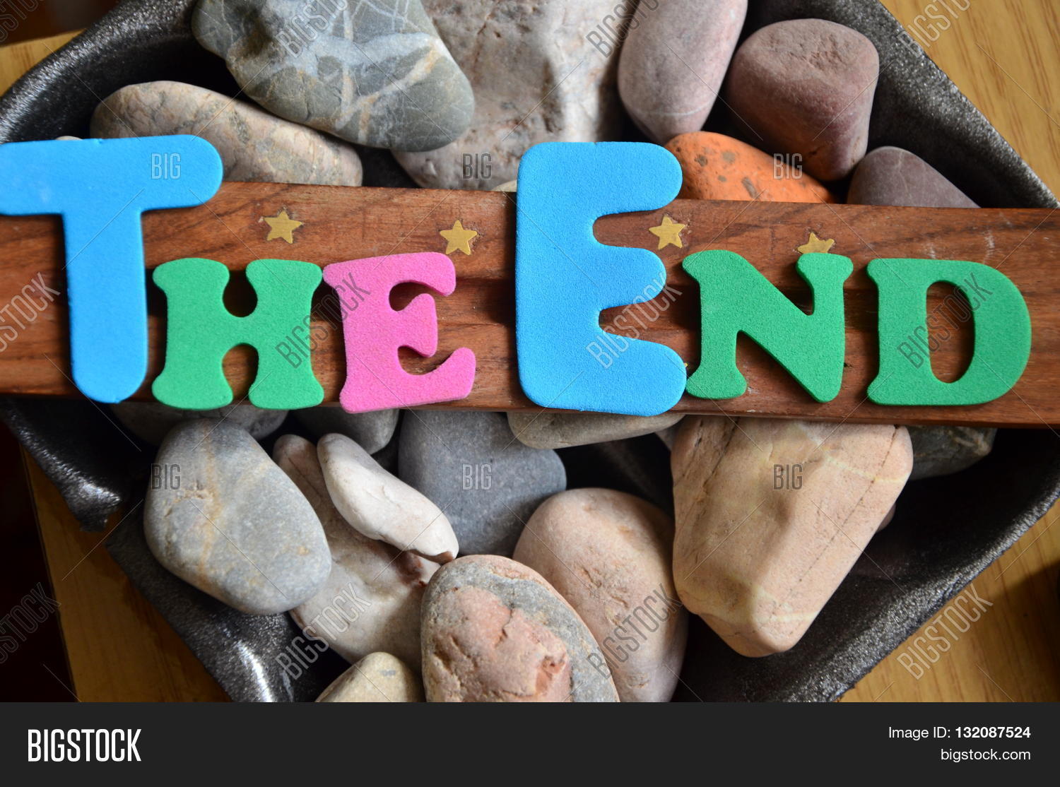 word the end on a abstract background