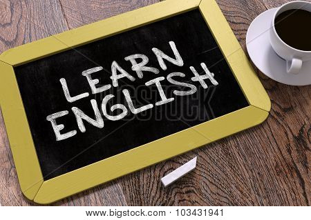learn english handwritten on chalkboard.