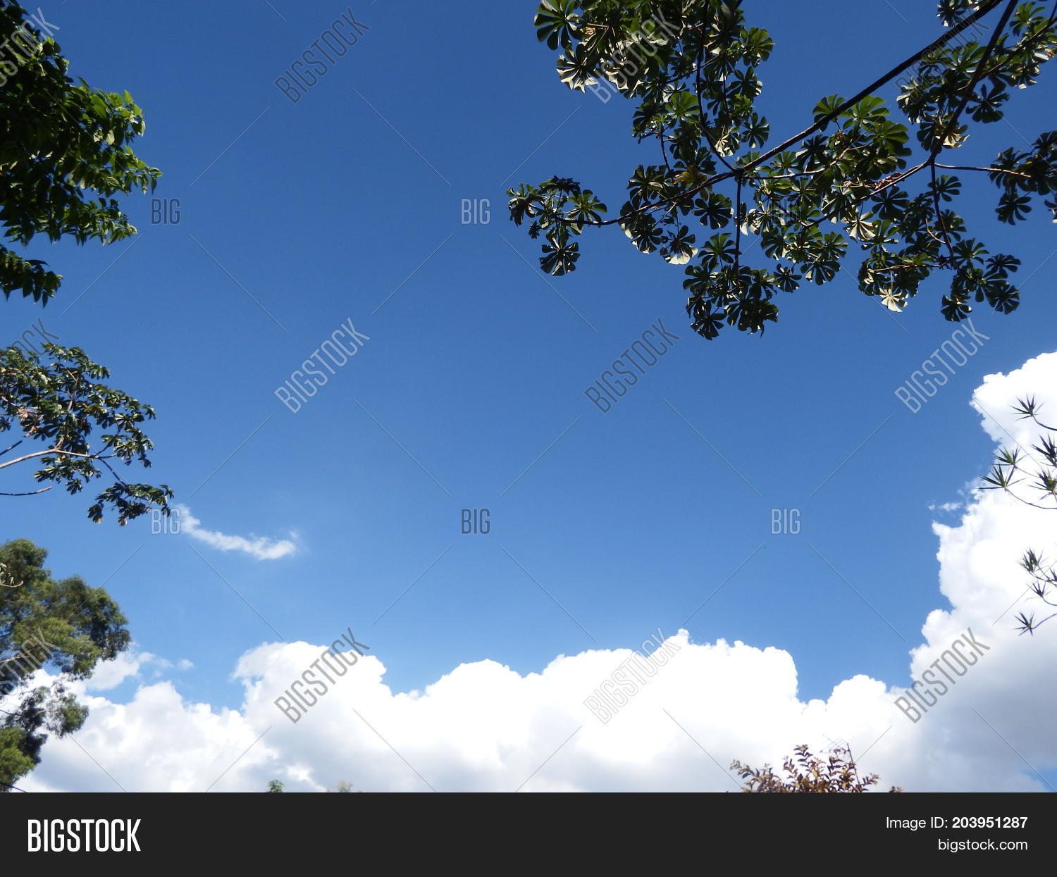 low angle view of cloudy sky on sunny day
