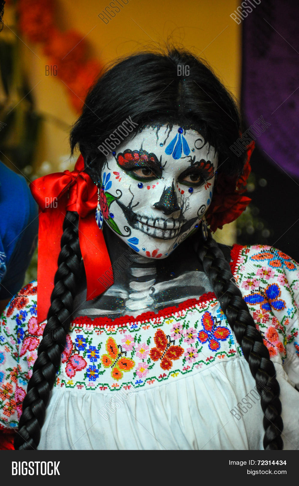 puebla, mexico - october 31st, 2013 : woman disguised for dia de