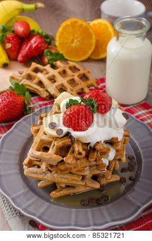 belgian waffles with chocolate chips and fruits