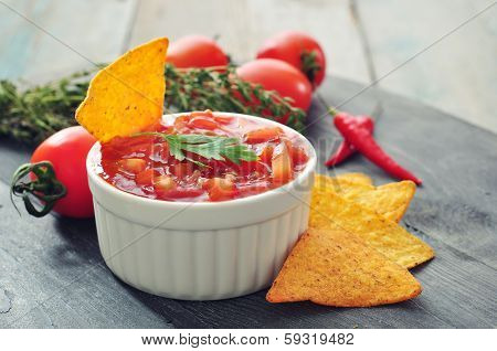 bowl of salsa with tortilla chips