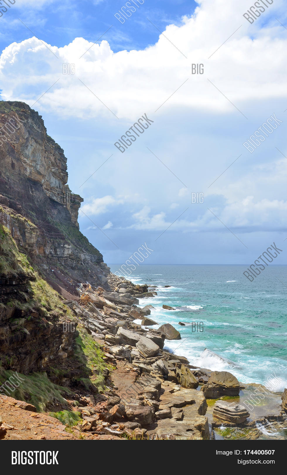 rugged coastal cliffs and rocky shore at garie beach on the new