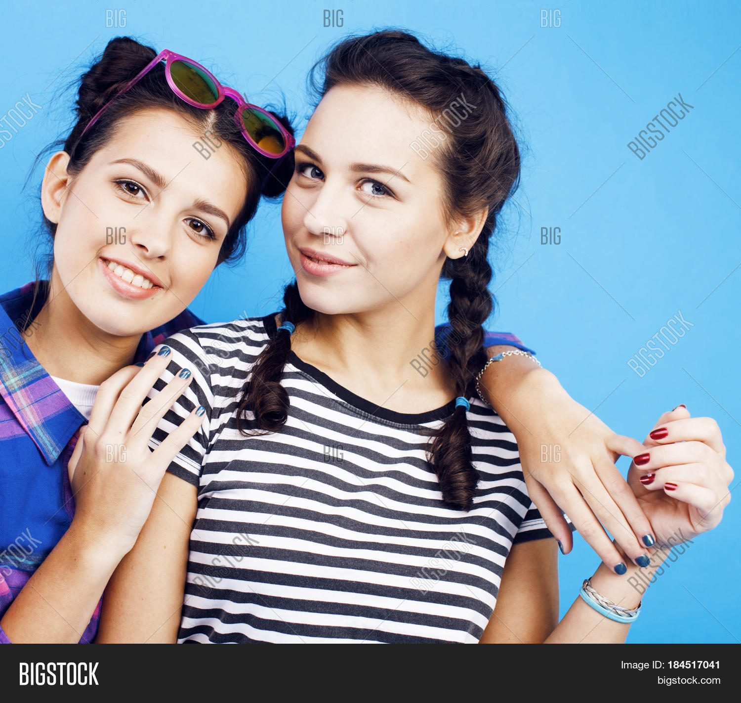 best friends teenage school girls together having fun, posing