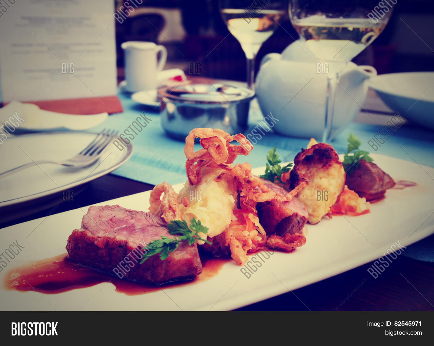 medium rare fried duck breast with fried onion and sauerkraut