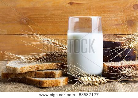 and wheat flour of rough grinding and glass of fresh cows milk