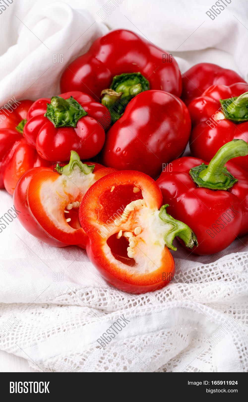 tomato shaped sweet pepper on white.