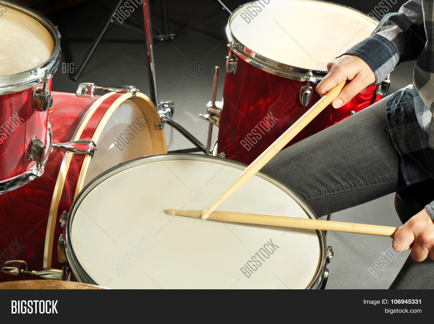 drummer playing the drums closeup
