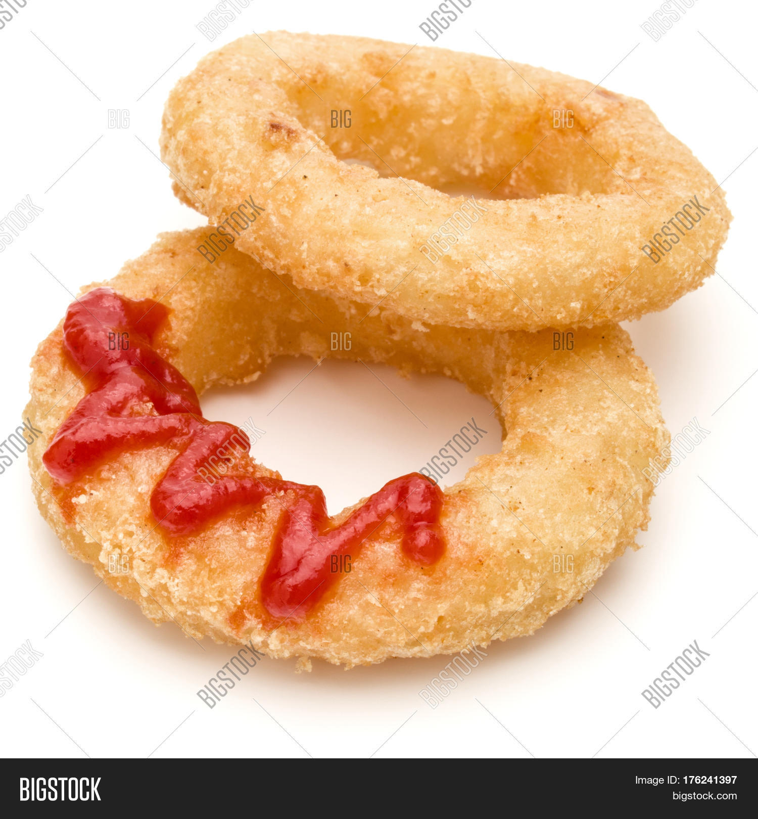 crispy deep fried onion or calamari ring with ketchup isolated