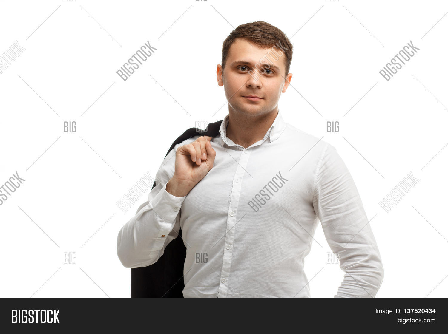 portrait of handsome businessman wearing white shirt threw his