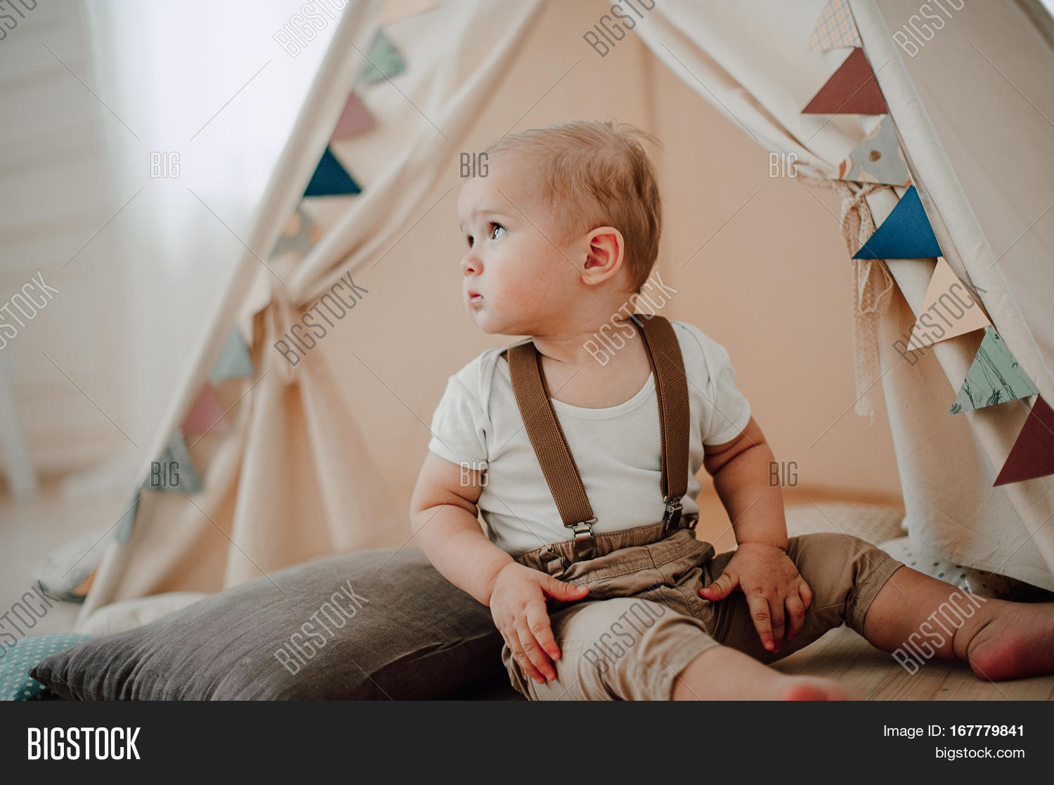 portrait of lovely little boy happy smiling celebrating 1 year