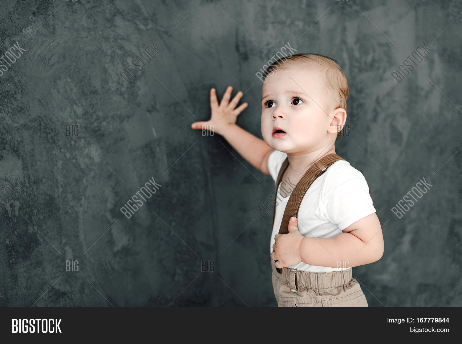 portrait of lovely little boy happy smiling celebrating 1 year