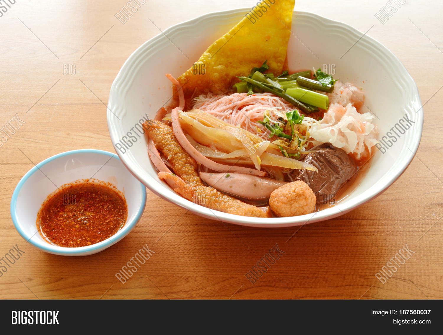 rice vermicelli with fish line and shrimp ball in red soup