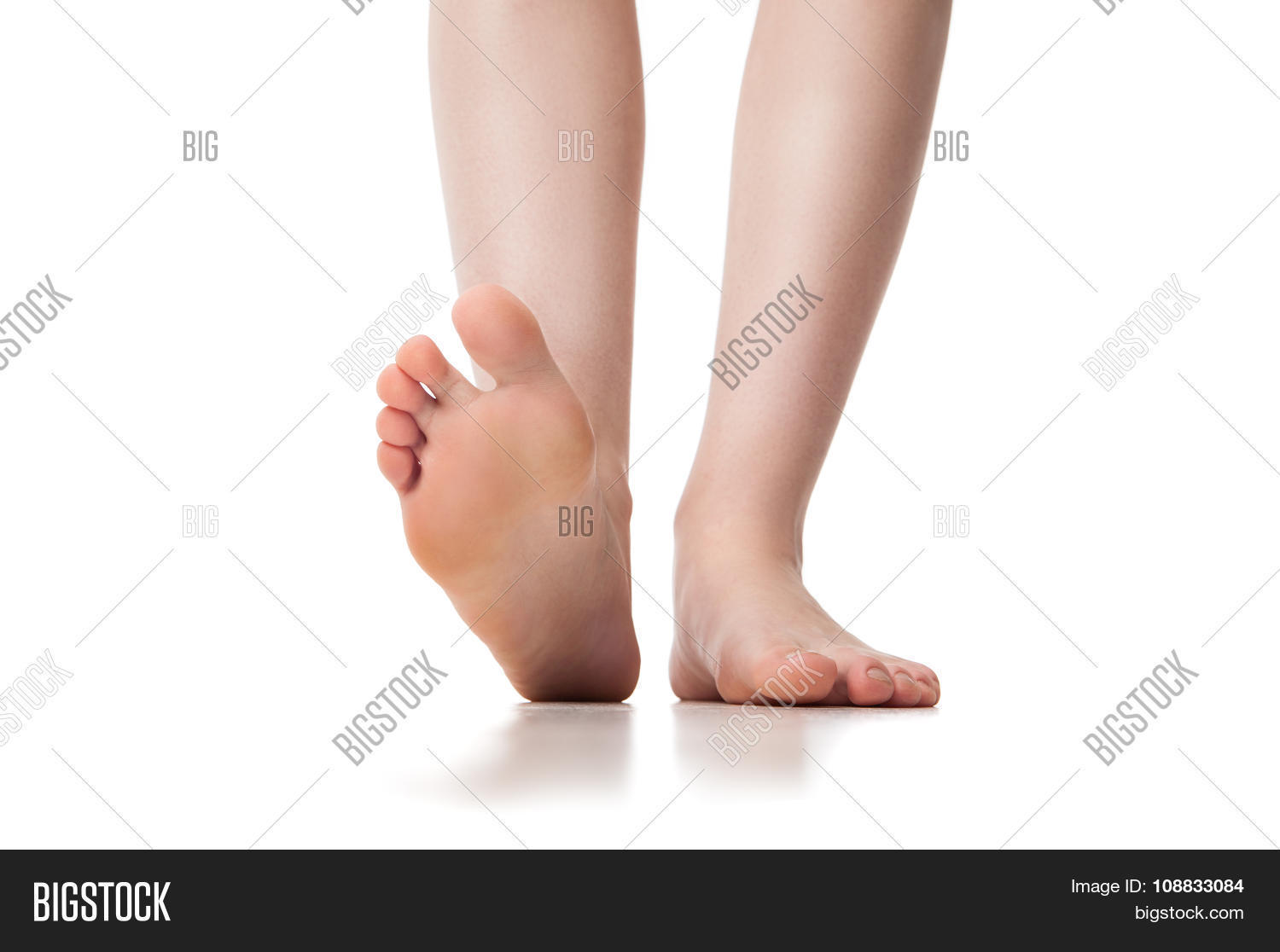 close up of legs of young woman. isolated on background