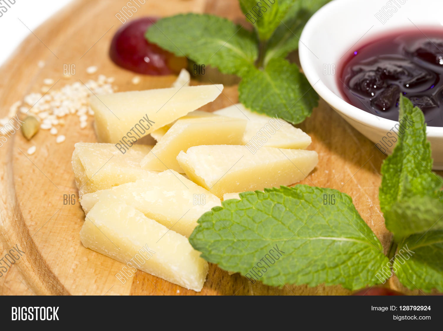 cheese plate with a large decorated the assortment of mint