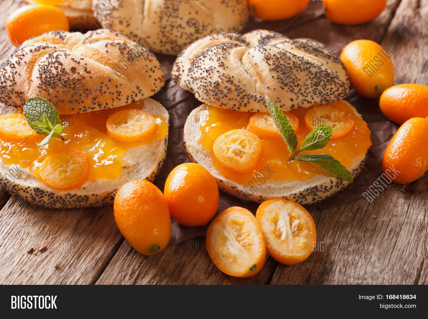 sweet buns with kumquat jam and cream cheese close-up on the