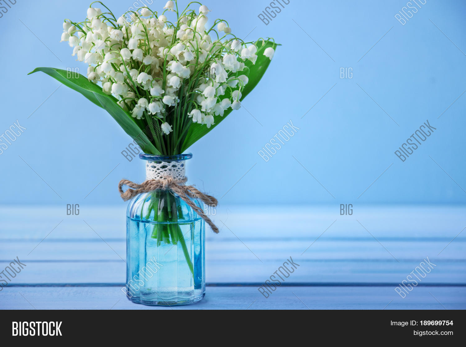 lily of the valley bouquet. space for text.